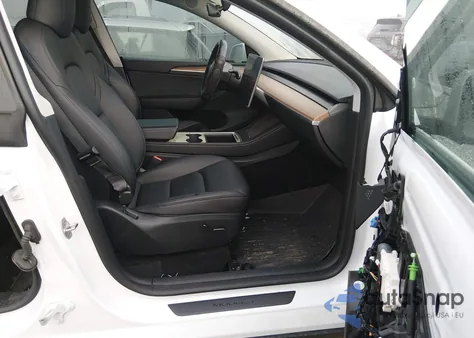 2023 Tesla Model Y Awd/Long Range Dual Motor All-Wheel Drive z USA, uszkodzony, nr VIN 7SAYGDEE9PF898056